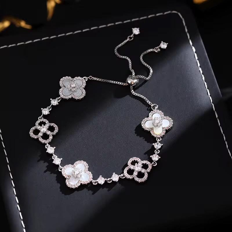 Luxury Silver Floral Bracelet – Diamond Clover Elegance