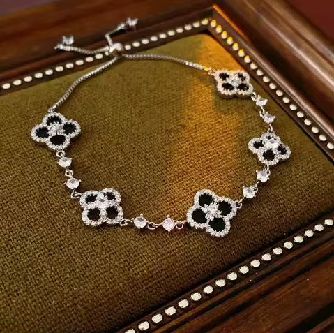 Luxury Silver Floral Bracelet – Diamond Clover Elegance