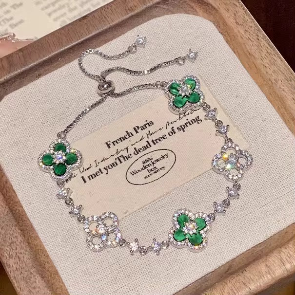 Luxury Silver Floral Bracelet – Diamond Clover Elegance